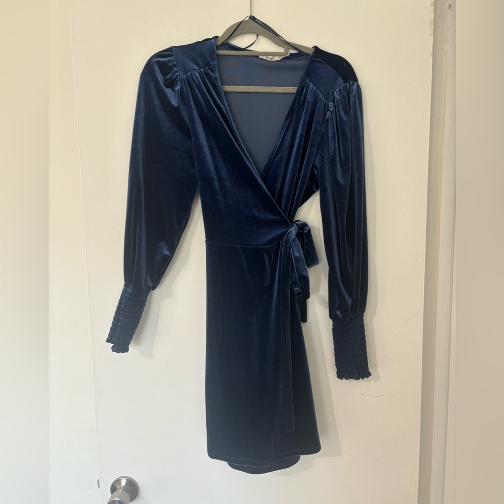 francesca’s blue velvet long sleeve mini wrap dress. Size: L